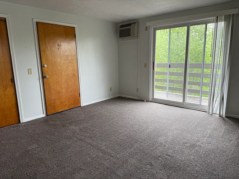 Living room with view of balcony