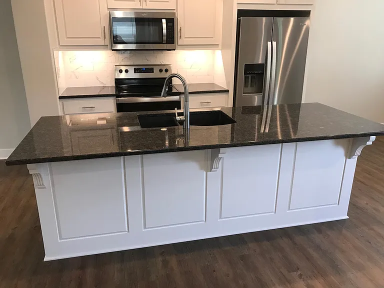 1st Floor kitchen with island overhang for bar stools