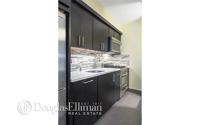 Sold by Douglas Elliman | media 9