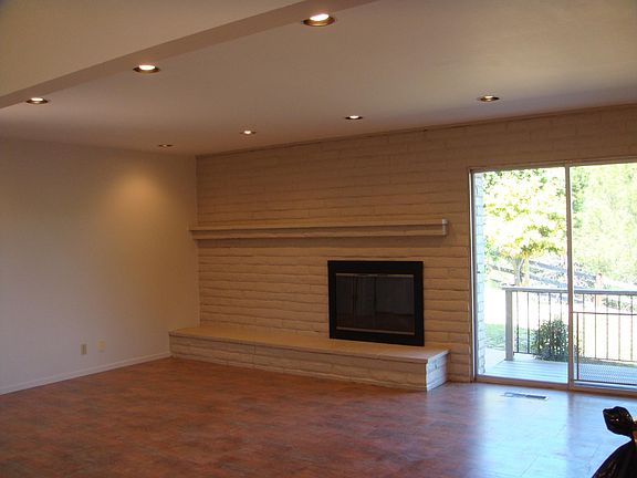 Family room with wood-burning fireplace