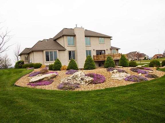 Spring is in bloom and beauty surrounds this home.