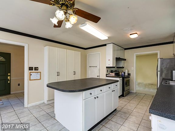 Spacious kitchen with island and pantry