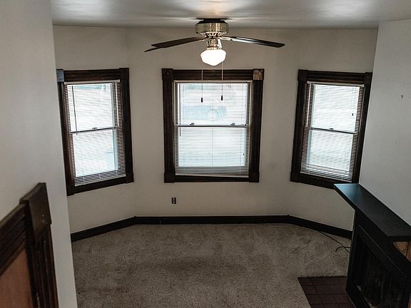 Living room with decorative fireplace