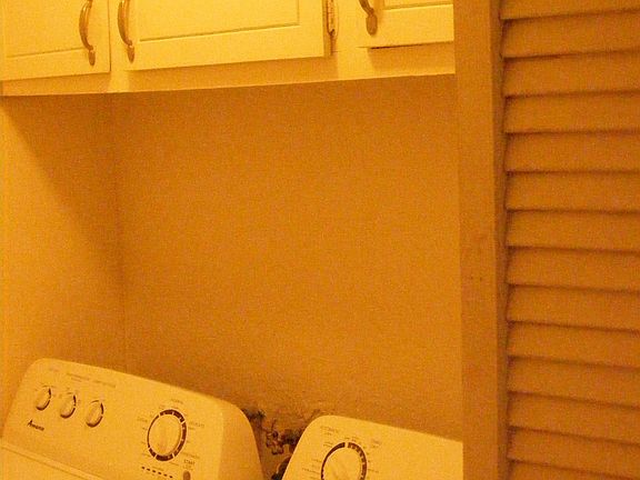 Laundry room upstairs with full size Washer and Dryer