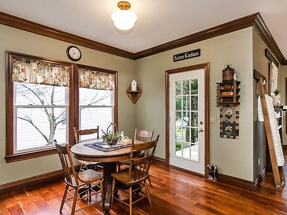 Locally sourced, wide planked cherry flooring in Dining Room. Access to front, wrap around porch (porch has it's own foundation)