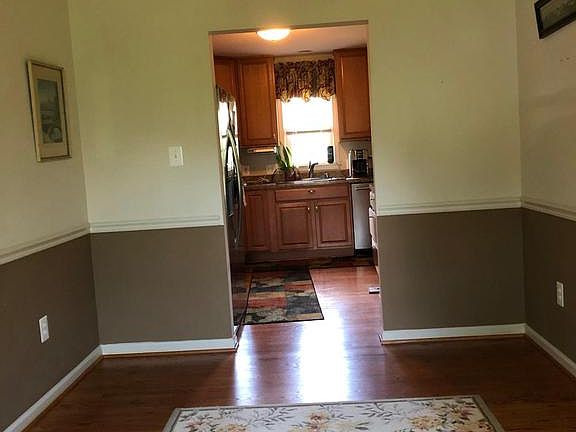 Dining Room with wood floors.