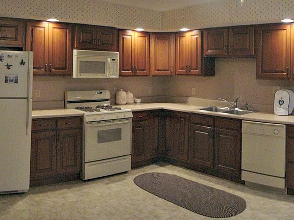 Large kitchen with recessed lighting.