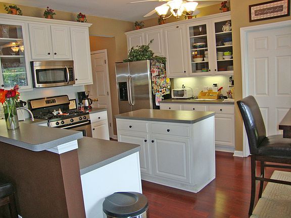 Oversized Kitchen features Gas Range, Island and Breakfast Bar