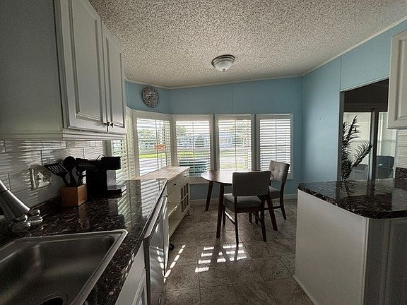 2nd image of 16384 SW Four Wood Way #Q-03