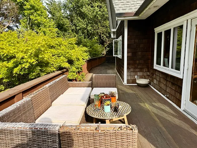 The house has a large wrap around deck, ideal for entertaining and relaxed family weekends where kids can seamlessly play on the large lawn and deck.