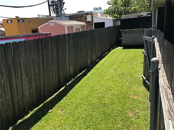 L shaped backyard and exterior shed