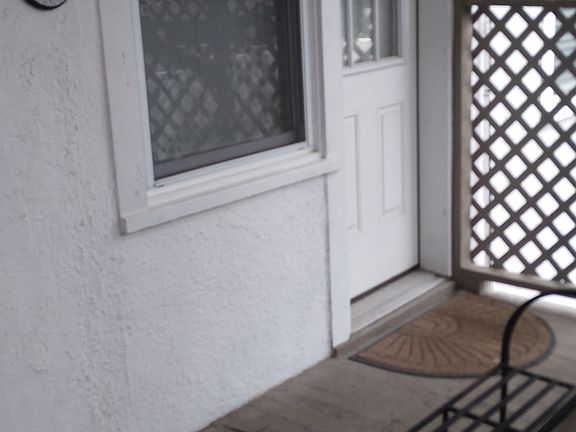 Back entrance near parking space