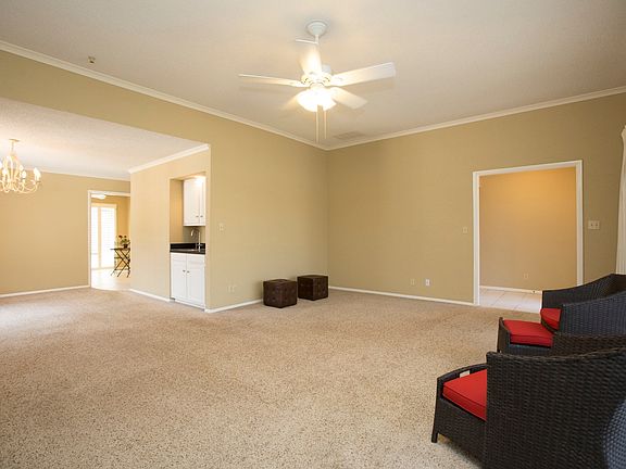 Living Room opens to Dining Room