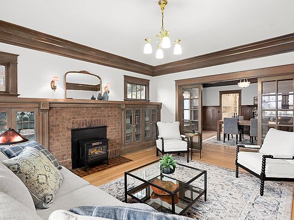 Fireplace with built in bookcases on either side