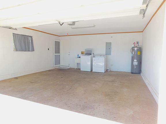 Full-size washer and full-size dryer. Newer water heater