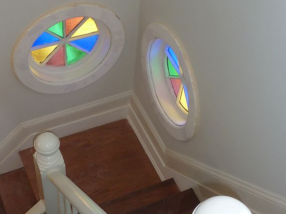 Front stairway with original Victorian glass