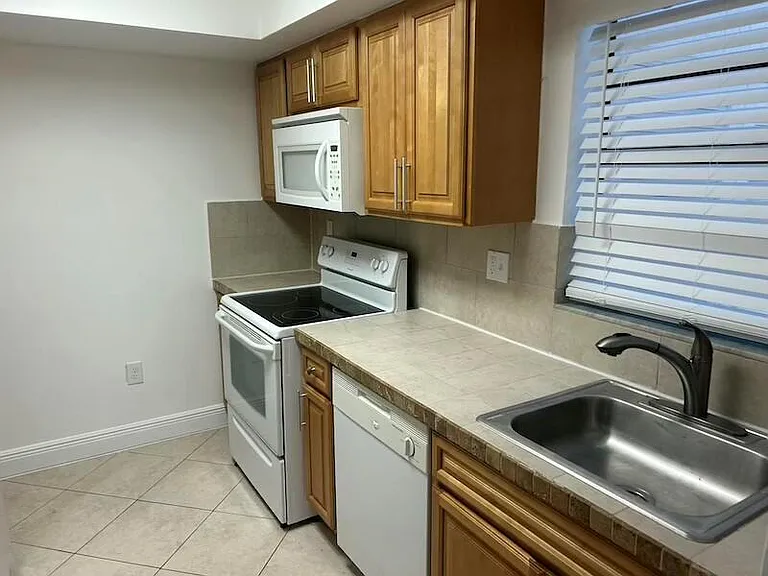 3432 NW 86th Way #D204 — Photo 23