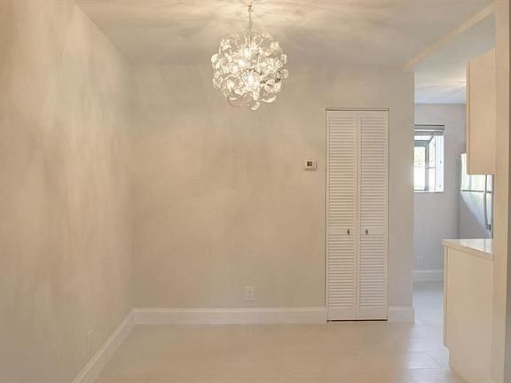 4th image of 703 Gardens Dr APT 101