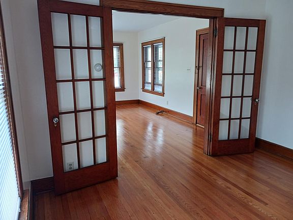 Beautiful French doors separating the living room & Dining room