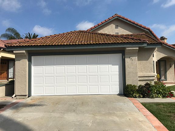 Street view - two car driveway and garage