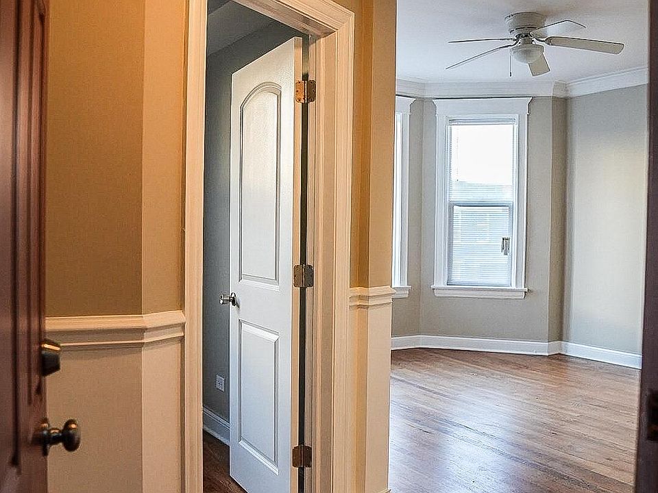 Front entrance to bedroom 1 on left and living room on right