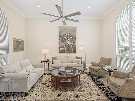 This formal living room is light and bright with double windows and could also be a fantastic study!