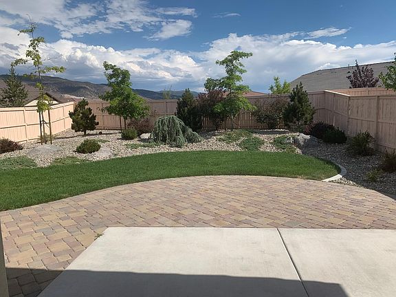 back yard with extended paver patio