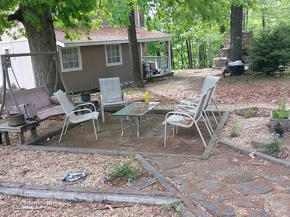 Patio with storage building