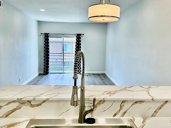 Brand new stainless steel ex-large sink with designer faucet.