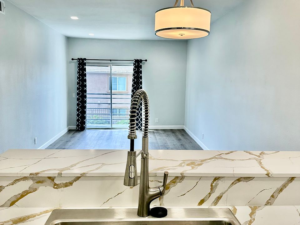 Brand new stainless steel ex-large sink with designer faucet.