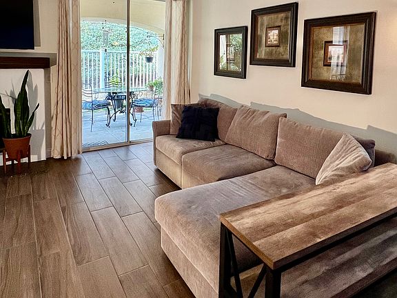Living room with access to patio.