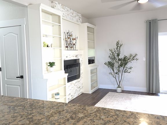 Living in style! Granite Countertops, drapes and guest closet. 
.