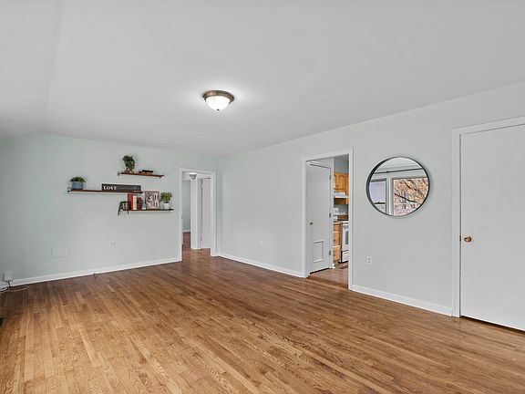 View of living room from front door wall