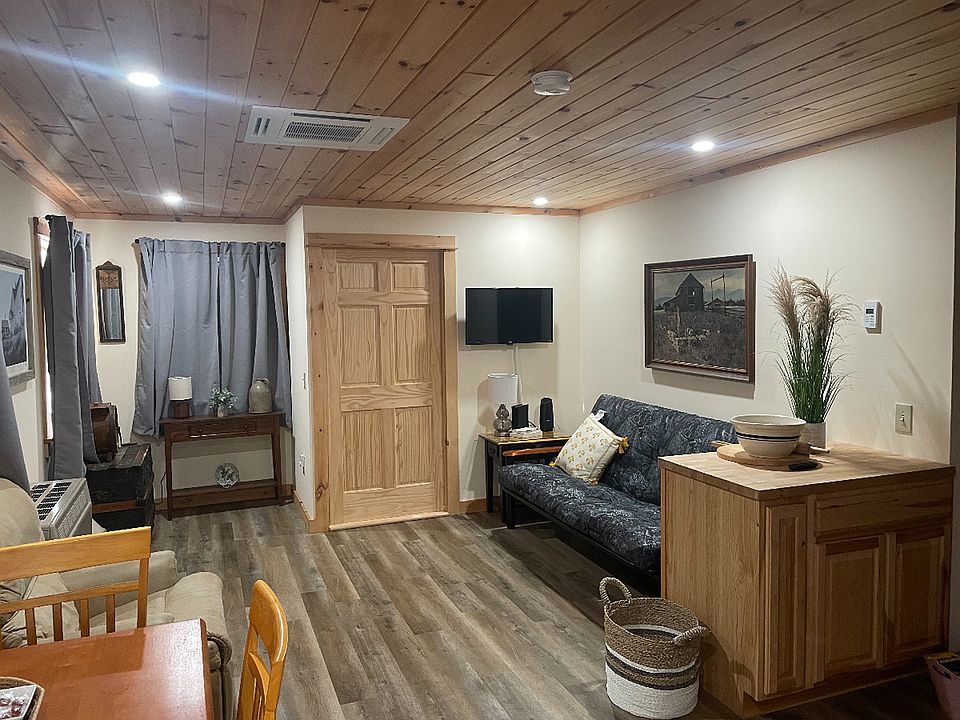 Living room with recliners and futon