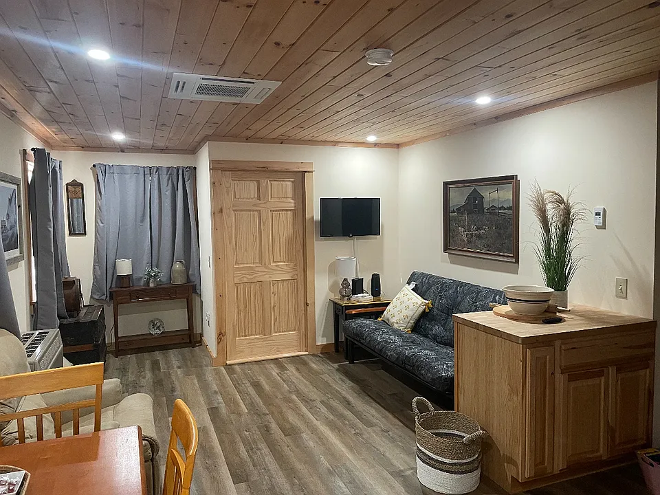 Living room with recliners and futon