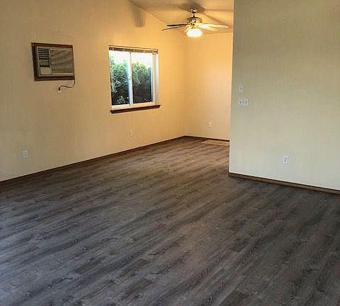 Large living room area with vaulted ceilings