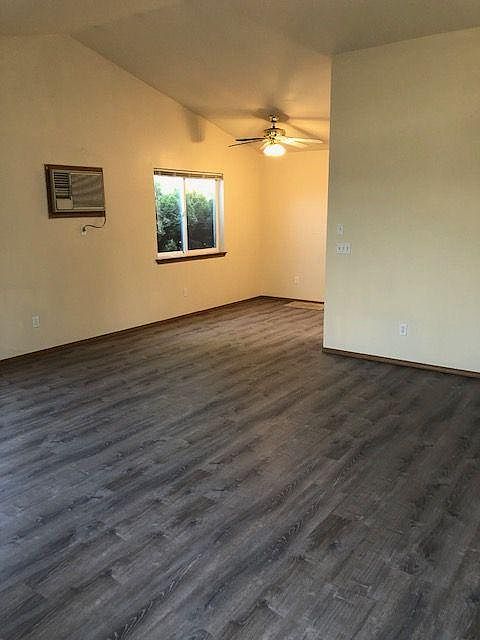 Large living room area with vaulted ceilings