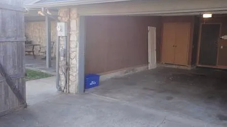 Two car garage with additional parking in back