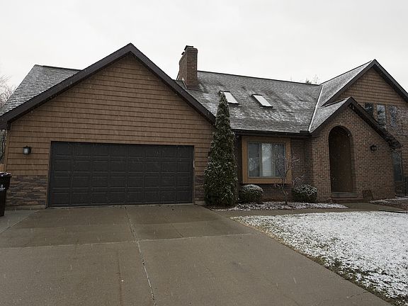 Lots of parking space. The loft above the garage offers additional storage capability.