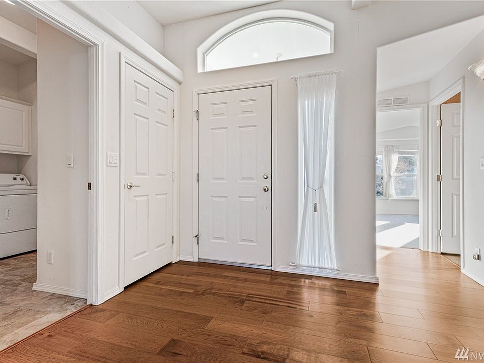 Gleaming hardwoods in the entryway. 