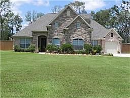 Beautiful brick and stone built by Village Builders that sets in a gated community close to everythi