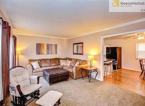 Spacious living room has room for lots of furniture.