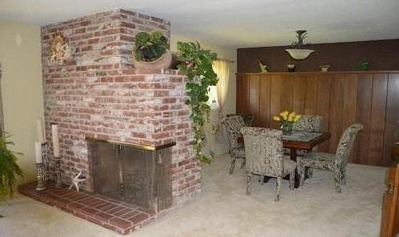 Large living room/dining room with fireplace