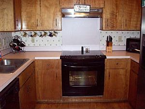 Spacious kitchen includes new appliances.