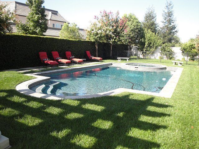 Fenced pool and 12' spa