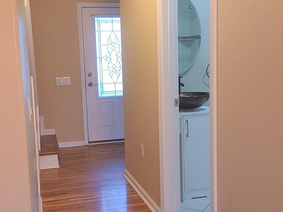 Front Door, MBR Down bath entry. Dining area & Family room behind