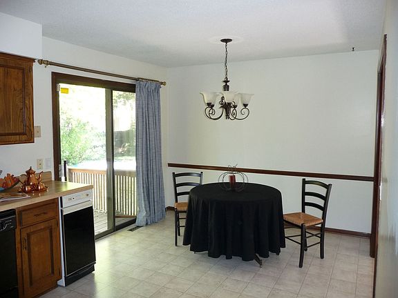 Roomy eat-in kitchen opens onto deck