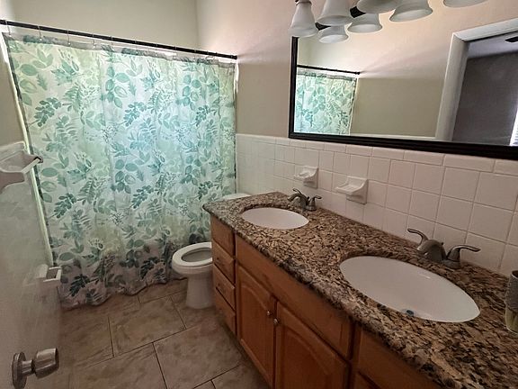 Master shower with tub and double vanity