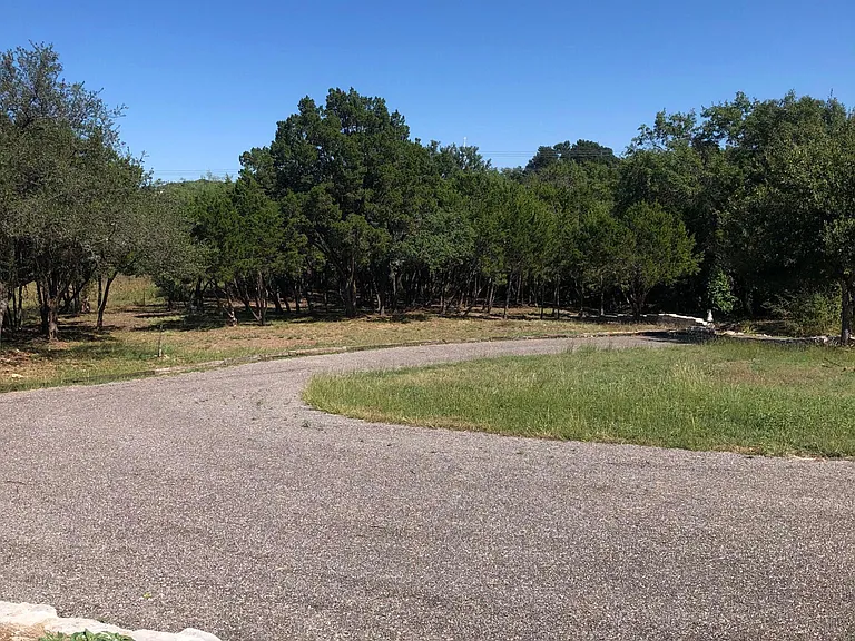 Driveway to the main entrance of the home.