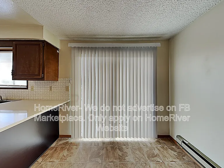 12620 E 31st Ave — Photo 3
